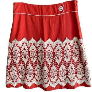 Anthropologie Floreat Orange skirt in size 8 features a crochet white lace o